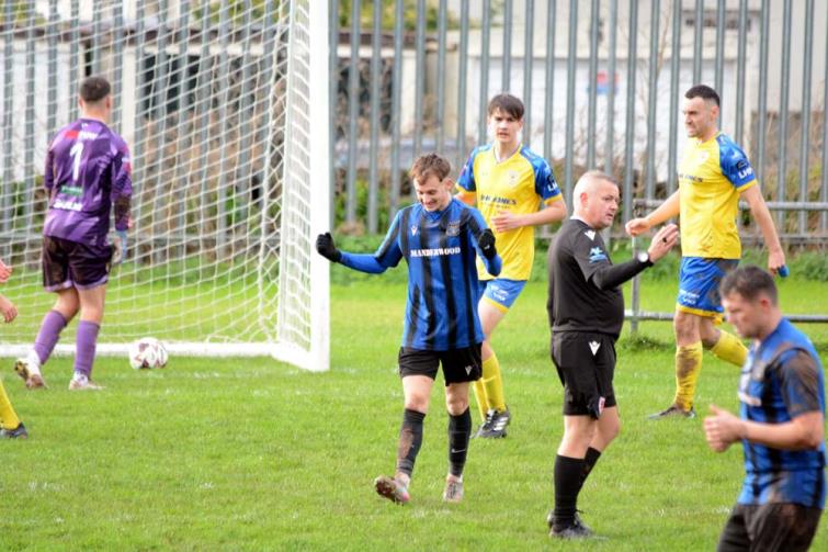 Cameron Brunton celebrates scoring for holders Hakin United in their win at home against Drefach. Picture Gordon Thomas
